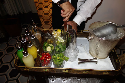 The cart was well-stocked with fresh juices and condiments.