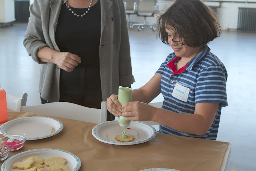 After their lesson in gardening on the rooftop, the kids headed down to to the NW showroom to decorate cookies baked by Sarah Carey. Hudson DiRe really loved this delicious activity!