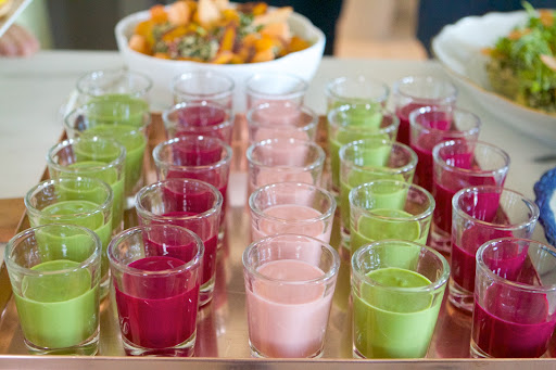 There were two different colors of beet soup and a fresh pea soup. They were served silky smooth and cold.