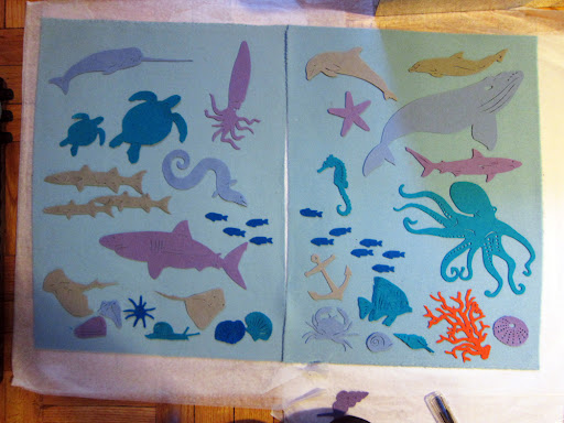 Laying out the ocean: With each scene, I stuck to a particular color palette. In the end, I opted for not including the bright orange piece of coral.
