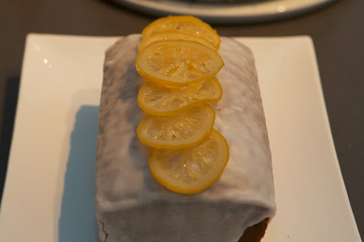 This pound cake has four hits of lemon: zest in the cake, lemon syrup brushed onto the cake when it's warm from the oven, the final glaze, and the candied lemon slices!