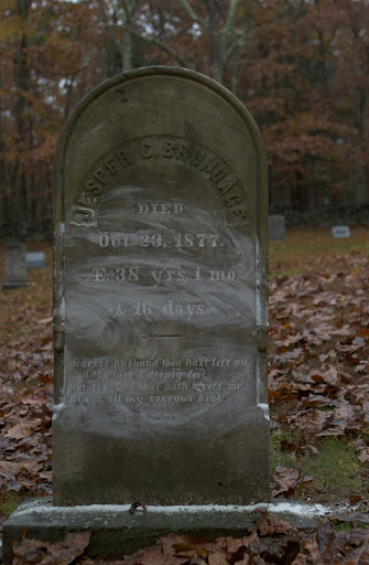 To facilitate reading the inscriptions, baking soda is rubbed over the words, making them quite visible. Jesper C. Brundace died on Oct. 23, 1877 and his wife stated - Dearest husband thou hast left me and thy loss I deeply feel. But tis God that hath bereft me, he can all my sorrows heal.