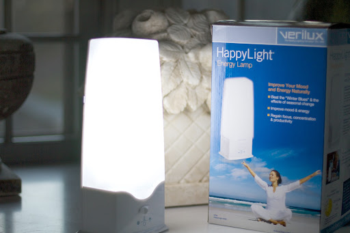 This is the Happy Light 6000 Energy Lamp. When placed on a table or other flat surface near eye level, the light provides just the right kind of illumination that's easily absorbed by the eye.