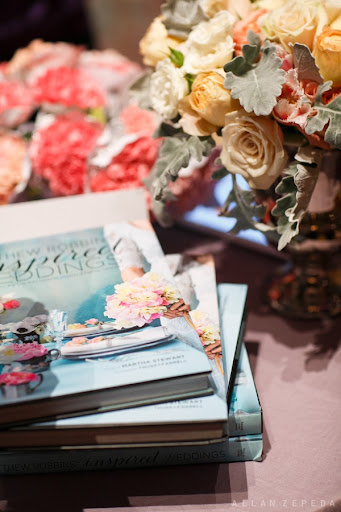 A display of Matthew Robbin's new book, Inspired Weddings, and gorgeous flowers - http://matthewrobbinsdesign.com/ - Photo credit: Allan Zepeda http://allanzepeda.com/blog/