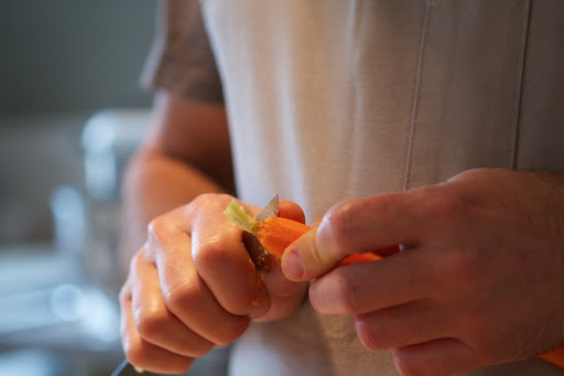 Pierre left the carrot stems intact, but carefully trimmed around them.