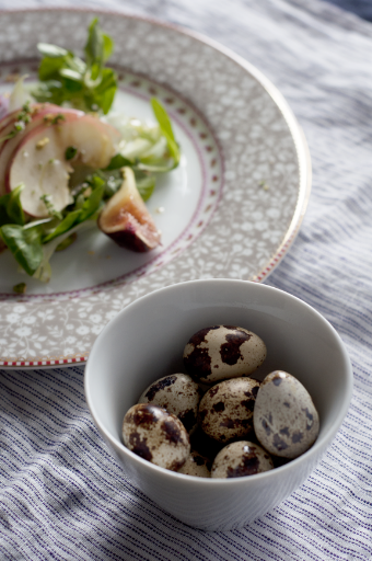 Quail eggs with salad