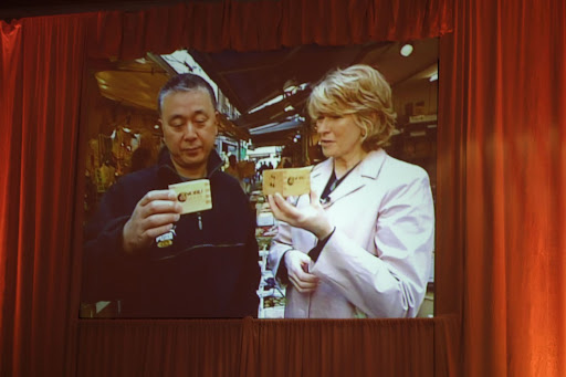 In 2000, Nobu and I toured Tokyo's Tsukiji Market, the largest wholesale fish market in the world. Nobu gave me an in depth tour of this fascinating place. Here we are studying traditional cedar wooden sake drinking cups called masu.