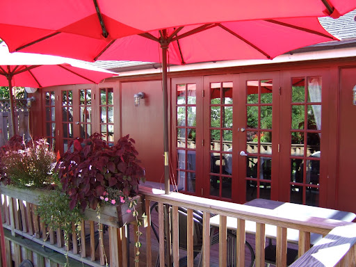 But there’s nothing quite like summer! This is the deck behind the restaurant, popular on cool summer evenings. Adam decorates with plants and flowers and fresh herbs, which we use in the kitchen.