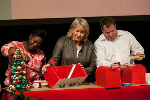 Home Depot employees joined me on stage to create the candy cane mailboxes. We used painters tape on a white mailbox to make the stripes and and then painted it red. When the paint dries and the tape is removed, you have white and red stripes!