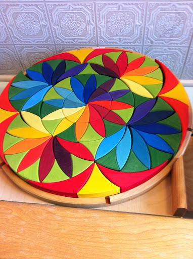 We visited John W. Sheets, a great toy store on Main St. in Northeast Harbor with super quality toys, like this colorful wooden puzzle.