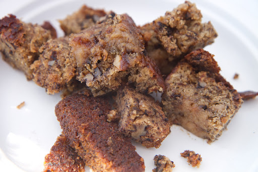 The banana bread was cut and crumbled into smaller pieces.