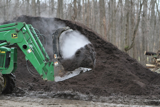 This steamy dark pile of compost is what I call, 'black gold'.