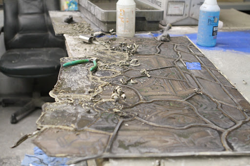 This stained glass is in obvious need of restoration. The old lead is carefully removed and the glass pieces taken apart.