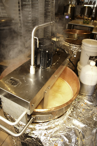 The caramel is cooked slowly in large copper kettles.