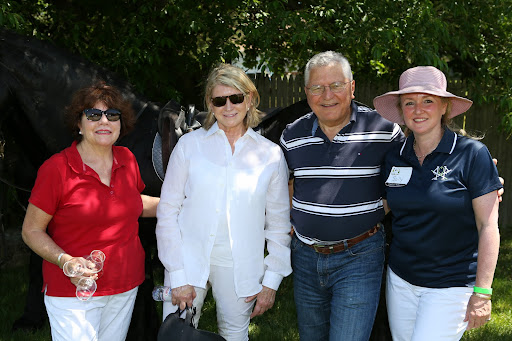 Here we are with Sally Lynch. The spacious tasting room was built on top of the barrel cellar and is surrounded by an inviting deck overlooking the vineyards. It's a lovely setting for private parties and weddings, and there are many special events throughout the year. Photo credit: Peter Marney