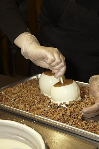 More toppings are added.