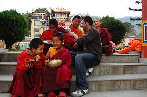 Another image from the upcoming book - Vikas drinking pur cha, or butter tea, with monks in Bhutan.