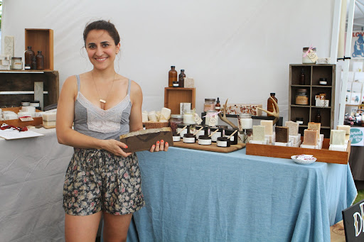 Jessica Morelli, founder of Di Palermo Body, specializes in the creation of beautifully handcrafted soaps and scrubs made with all-natural materials. Here she is holding an uncut slab of her original coffee soap. http://www.etsy.com/shop/dipalermobody