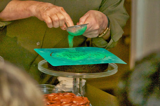 Stenciling is an easy way to finish a cake with dramatic results. I sifted colored petal dust over the stencil.