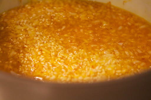 As Pierre stirred and cooked, the risotto turned a vibrant golden color.