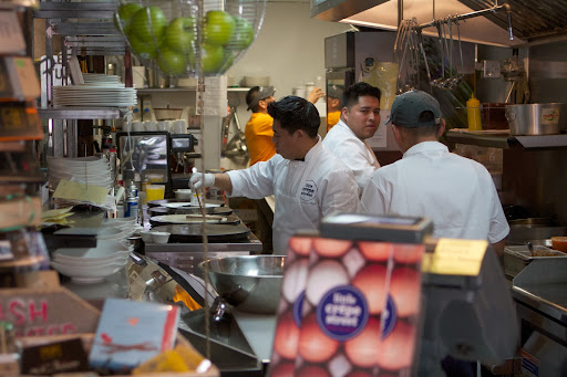 The open galley kitchen is small and compact and functions very well.