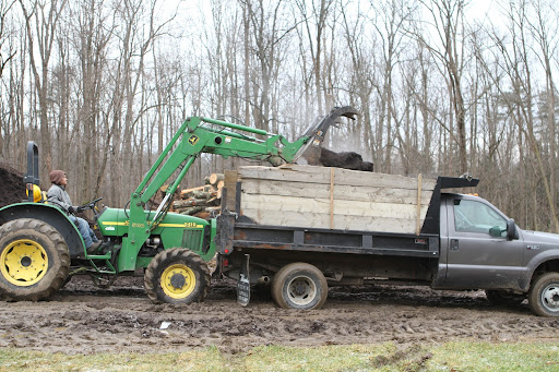 The compost pile is heated gradually from about 50- to about 113-Fahrenheit, which is the temperature at which compost microorganisms begin the decomposition of the material.