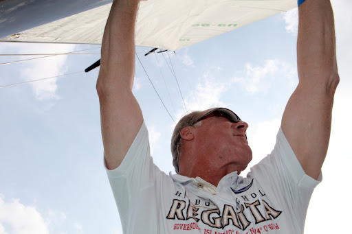 Gary Van Dis holding the boom - The regatta brings nearly 600 people out to Governors Island, where they can get a personalized tour of the Harbor School by the students.