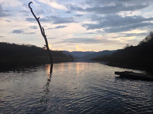 To get back to camp that evening we were taken across the narrow waterway on a raft. All was quiet as the sun began to set.