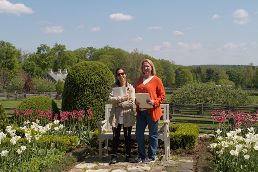Lisa Wagner and Kimberly Miller-Olko, MSLO’s SVP of Video Development and Programming, talk business while they soak up some sun.