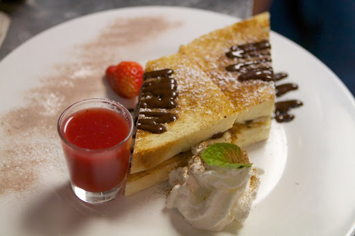 Bonnie is also very proud of this sweet creation - a chocolate grilled cheese sandwich served with strawberry Prosecco. The bread is sliced challah and the filling is brie and semi-sweet chocolate. The whipped cream garnish is freshly whipped.