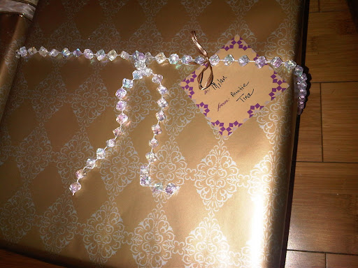 Katina Francis - A close up of the gift tag
