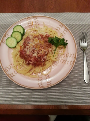Madeliene Sumera made pasta with meat sauce, fresh grated parmesan cheese, and herbs from her garden.