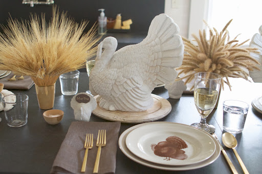 My Wedgwood Drabware plates were decorated with a gorgeous clip-art tom turkey turned decal. You can find it and instructions at marthastewart.com/turkey-decals.