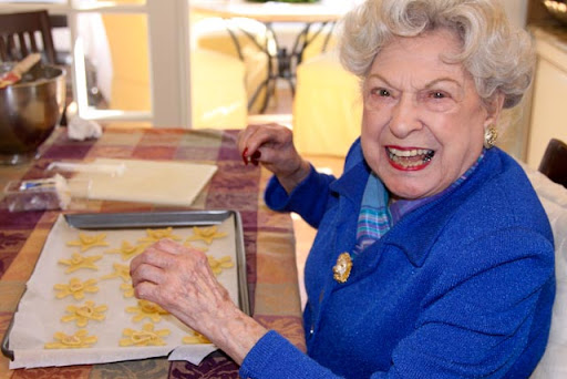 Rachel Tombes - My 93 year old Nana sets up shop in my Mom’s kitchen and all of the women in the family spend the day making about 200 Italian Christmas Cookies under Nana’s watchful eye, to send to friends and family for the holidays.