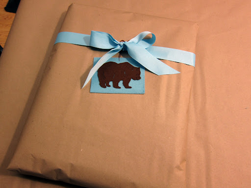 I wrapped the gift in craft paper and tied it with a blue ribbon and a simple tag.