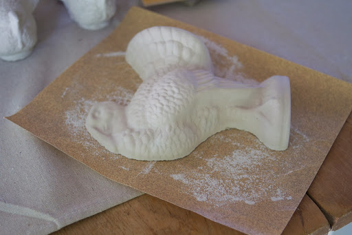 For a two-part turkey, use 80-grit sandpaper or a sanding sponge to sand the flat back sides smooth.