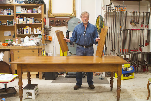 This farm table was successfully shortened from 10-feet to 7-feet. Richard is holding some of the pieces removed.