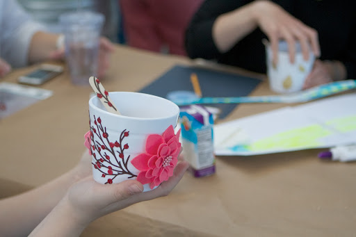 This use of floral stickers and paper flowers from the Martha Stewart Crafts line is very pretty.