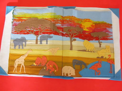 Scene 4 - When I think of the continent of Africa, I see something similar to this spread. Although the background depicts the Sahara Desert, I chose to include some of the most symbolic animals in all of Africa.
