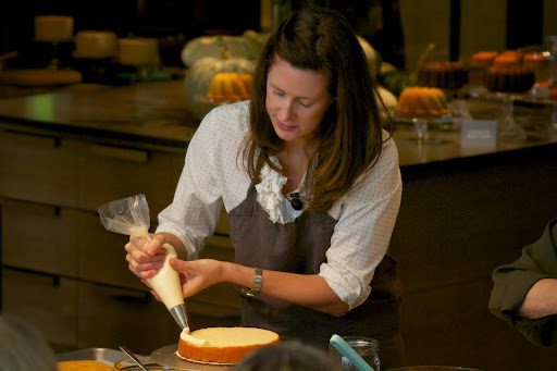 Jennifer Aaronson, Editorial Director of Food and Entertaining for Martha Stewart Living, worked tirelessly on the Cakes book. Here, Jennifer piped an icing dam to hold in the lemon curd filling for our Tender Lemon Cake.