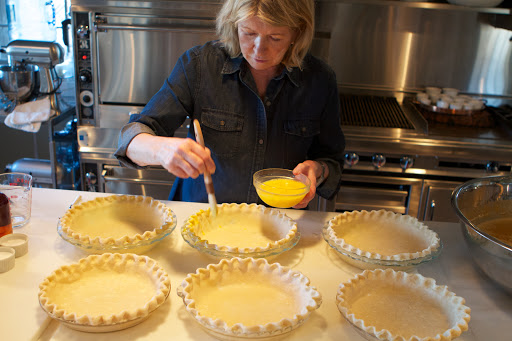 To make a beautiful pie, I like to brush the edges with an egg wash, which will cause the edges to brown nicely.