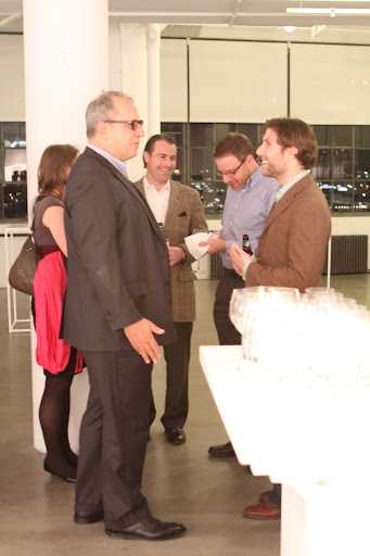 Here's Chris with the book crew. Dan is talking to Adrian Zackheim, the publisher. To Dan's right is Will Weisser, head of publicity. The young woman partly obscured by Adrian is Brooke Carey, the very talented editor of