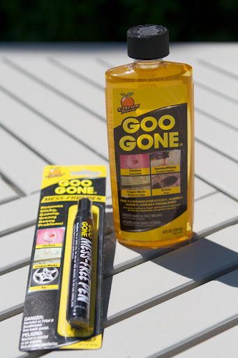 I really like Goo Gone for removing sticky, gummy, greasy, and gooey problems on hard surfaces, carpeting, upholstery, clothing, and more. http://www.googone.com