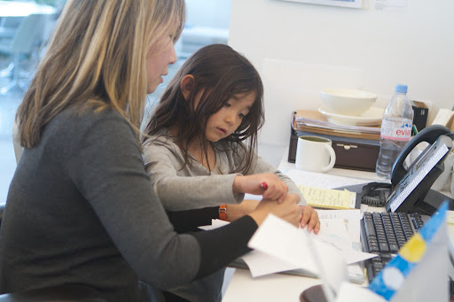 After a light breakfast, the children interviewed their parents at their work space. This is Soo Jee Lee and Summer.
