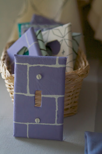 Among the many beautiful towels and aprons and bags, Michelle also hand-crafts cute eco-friendly outlet covers.