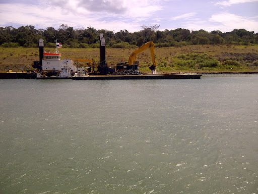 The Panama Canal is constantly maintained, giving a clear passage between the Atlantic and Pacific Oceans. This is a bucket dredge working to maintain the depth of the canal.