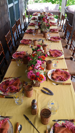 I then attended a lovely luncheon at the pond side home of Kathy and Bill Rayner. I loved their table setting, especially the way the fringed napkins were folded.