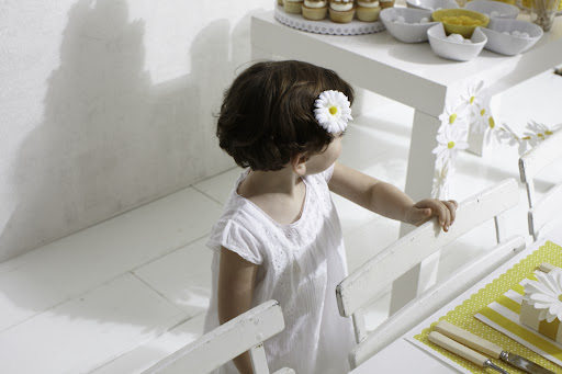 Darcy made sure the star of the party had her own matching accessories, like this daisy hair clip.