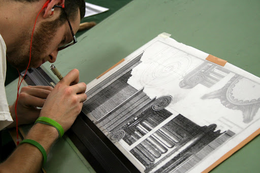 Student James Hess working on a project for his drawing and drafting course. Each student is required to take three semesters. ACBA finds it important to unite one's ideas with the ability to express it with one's hands. Constructively, the idea is a clearer project to the end customer.
