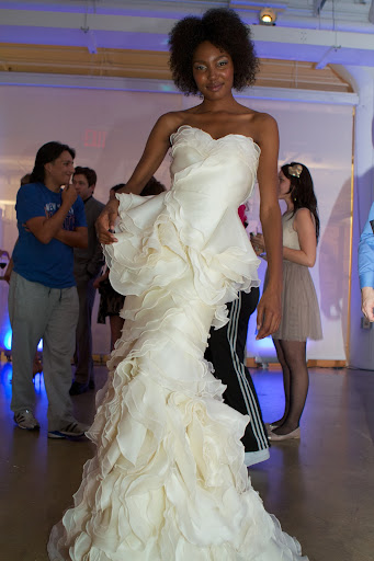 Unsigned model, Alexius Diana has appeared on America's Top Model and Essence Magazine. She is wearing a beautiful wedding dress designed by Leanne Marshall http://www.leanimal.com